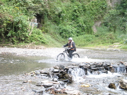Worlds Most Dangerous Road - Briony Riding through Water